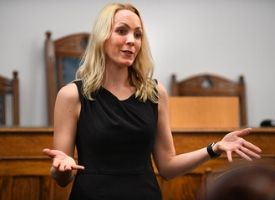 a woman holding a guitar
