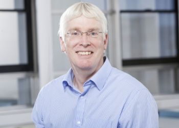 a person standing in front of a building