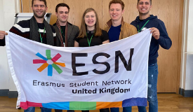 a group of people posing for the camera