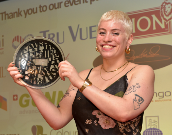 Sophie Woodward with her Student Artist of the Year award from the Fine Art Trade Guild