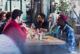 Students talking around a table