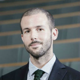 a man wearing a suit and tie