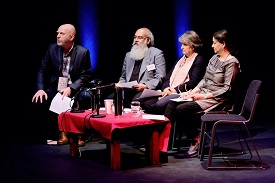 a group of people sitting at a table
