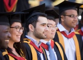 a group of people posing for the camera