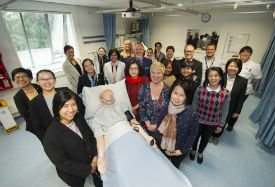 a group of people posing for the camera