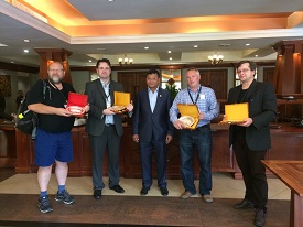 a group of people standing in a room