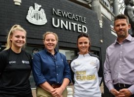 a group of people posing for a photo