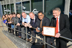 a group of people posing for the camera