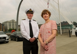 a person standing posing for the camera