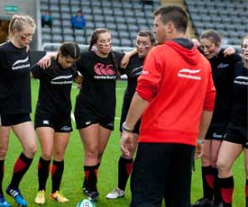 a group of young men playing a game of football