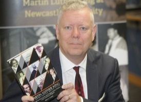 a man wearing a suit and tie