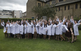 a group of people standing in front of a building