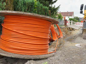 a boat sitting on top of a dirt field
