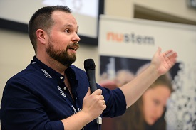 a man holding a microphone