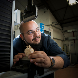 a man that is eating some food