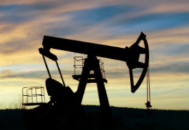 a sunset over a body of water