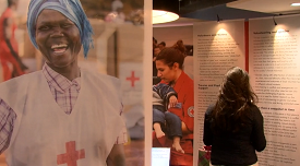 a man standing next to a woman