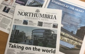 a close up of a newspaper