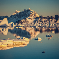 Sea ice reflections around Rothera Point, home to a research station and British Antarctic Survey (BAS) base on the Antarctic Peninsula. Photo by Steve Gibbs