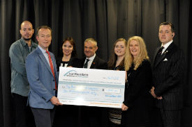 a group of people posing for the camera