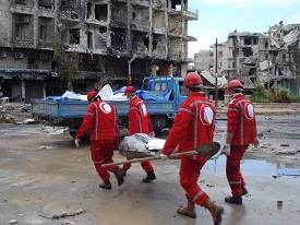 a group of people walking down a street