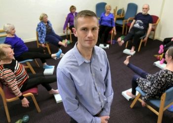 a group of people sitting at a table