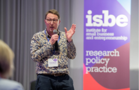 a person holding a sign