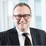 a man wearing a suit and tie