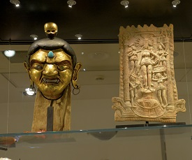 a reflection of a mirror posing for the camera