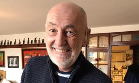 a man smiling for the camera