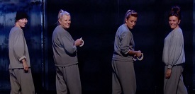 a group of people standing in a room