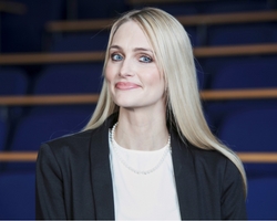 a woman smiling for the camera