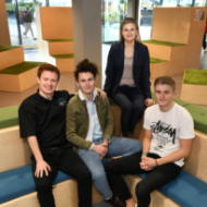 a group of people posing for the camera