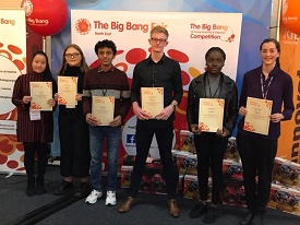 a group of people posing for the camera