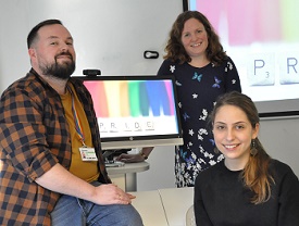 a couple of people that are standing in a room