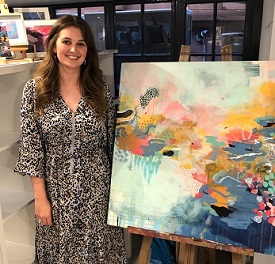 a person standing in front of a store