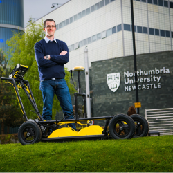 Dr Craig Warren is pictured with a Ground Penetrating Radar (GPR) system manufactured by Sensors & Software. The gprMax software can be used to inform interpretations of GPR data from systems such as this.