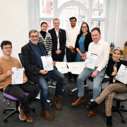 Members of staff from the Department of Architecture and Built Environment at Northumbria University celebrate the Surveying programmes retaining RICS accreditation.