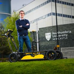 Dr Craig Warren pictured with a ground penetrating radar