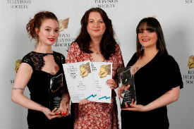 a group of people posing for the camera