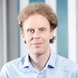 a man smiling for the camera