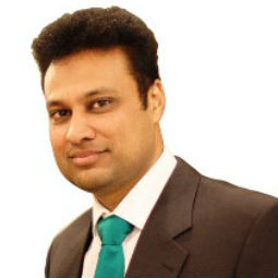 a man wearing a suit and tie