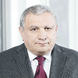 a man wearing a suit and tie