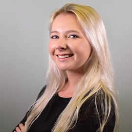 blonde lady smiling to the camera