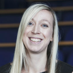 a woman smiling for the camera