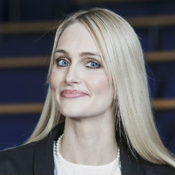 a woman smiling for the camera