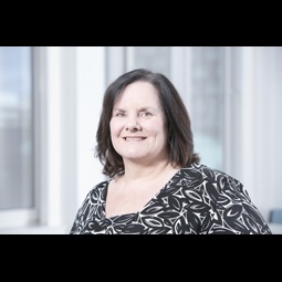 a woman smiling for the camera