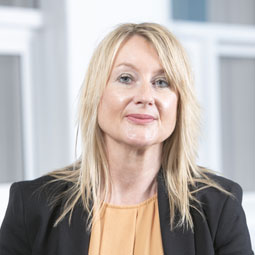 a woman smiling for the camera