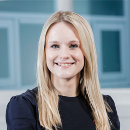 a woman smiling for the camera