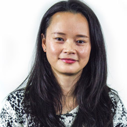 a woman smiling for the camera